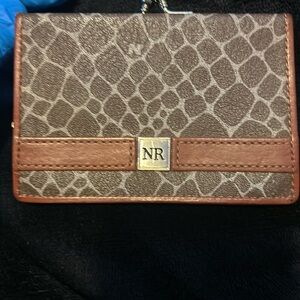 Used Nina Ricci coin wallet